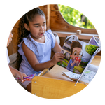 Open pages of the tooth fairy storybook showing colorful illustrations and bedtime story text